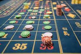 muara777 slot live-dealer studio during SEA Games with multiple blackjack and roulette tables broadcasting simultaneously in HD